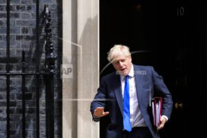 Britain’s Boris Johnson battles to stay as PM amid revolt